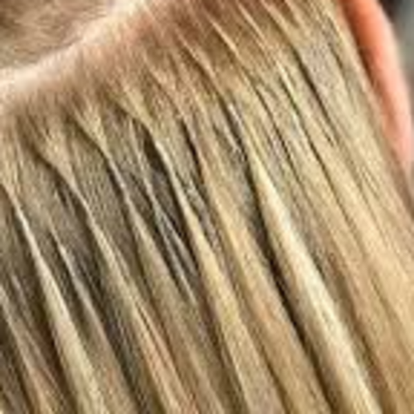 Aplicación de Extensiones de Cabello