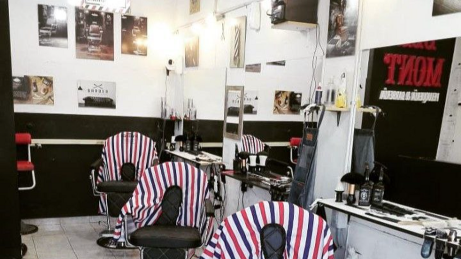 Barbería Delmont banner