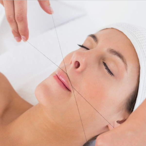 Depilación bozo con hilo